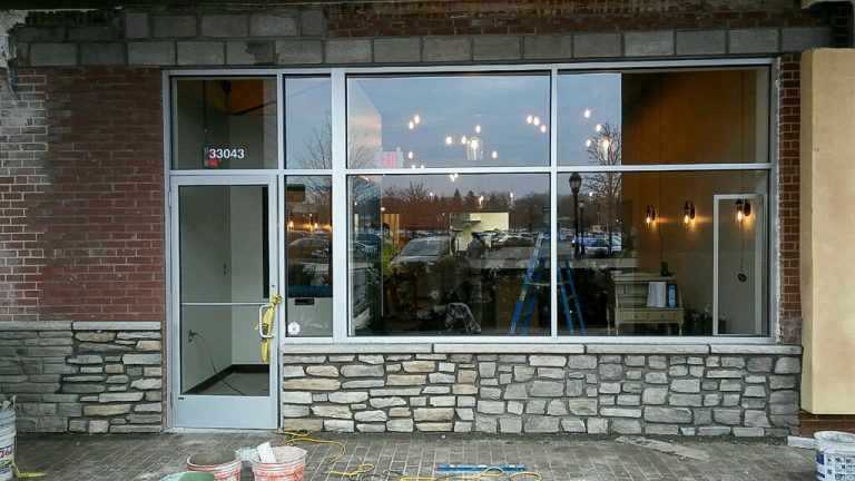 commercial masonry restoration in michigan and new facade in stacked stone