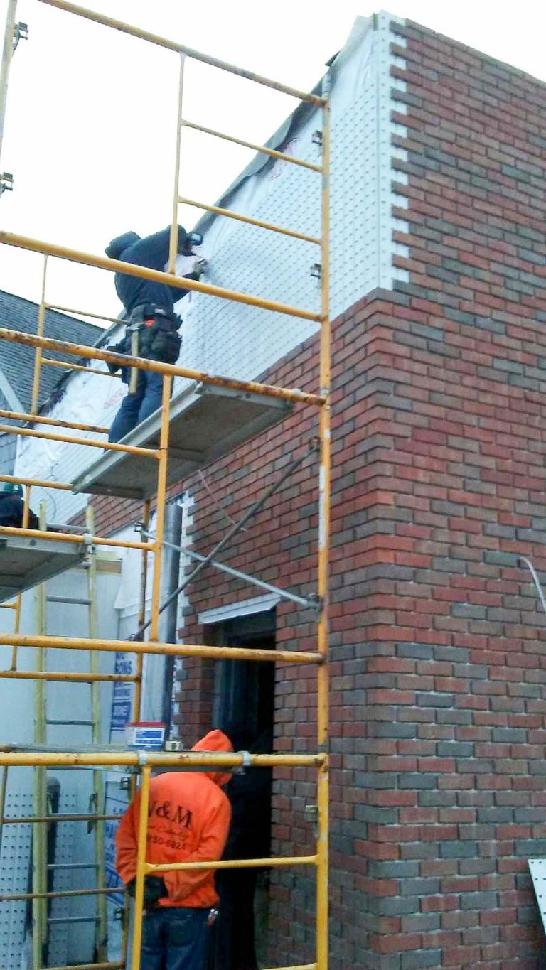 Brick installation on new construction commercial building