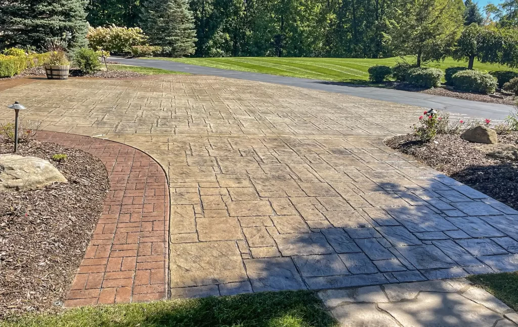 Stamped concrete driveway with dual color and pattern