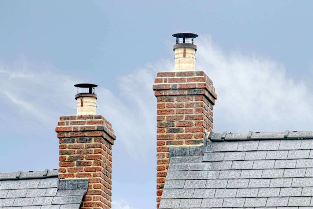 Two brick chimneys side by side