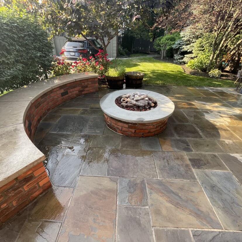 circular fire pit on blue stone, flag stone