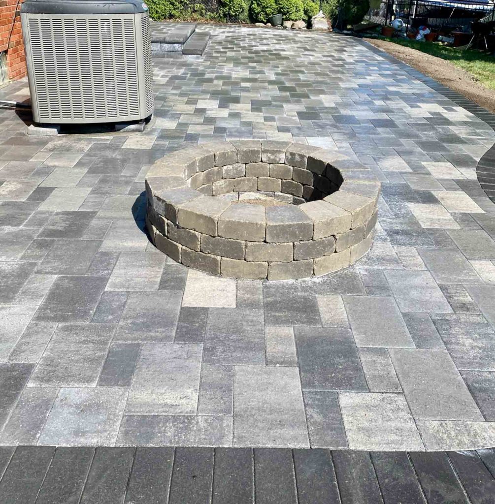 Harbor Stone Paver Patio designed by N and M Restoration in a beautiful home in St.Claire Shores Michigan. Visit our website at nandmrestoration.com for more information about Fendt and other decorative brick paver providers. We’re happy to help if you’d like an estimate contact us by website , Facebook, or the phone.