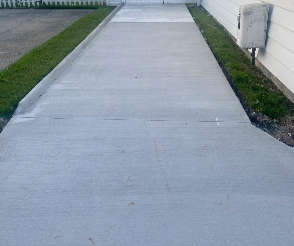 long driveway on side of house