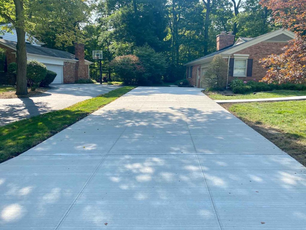 a finished standard driveway made of concrete