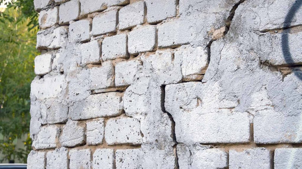 Cracked brick may be a sign of foundation failure.